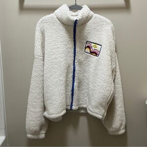 Grayson Threads Cream Teddy Jacket with Blue Zipper and Multicolor Patch